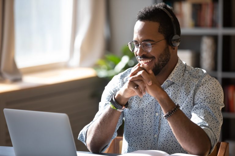 Happy,Millennial,African,American,Man,In,Glasses,Wearing,Headphones,Enjoying