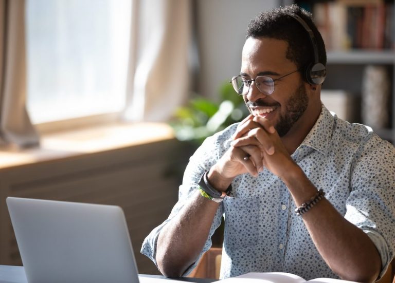 Happy,Millennial,African,American,Man,In,Glasses,Wearing,Headphones,Enjoying